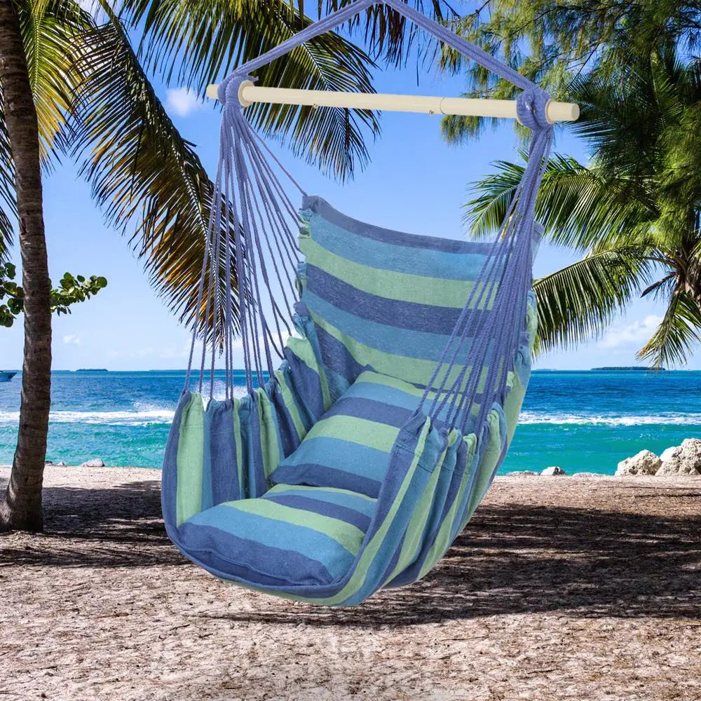 Blue cotton canvas hanging rope chair with pillows for indoor use